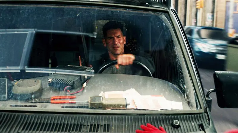 The Punisher behind the wheel of his armored van